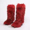 Mid-calf faux fur boots in vivid red with a long, shaggy texture and rounded toes, UnWritten Style statement footwear.