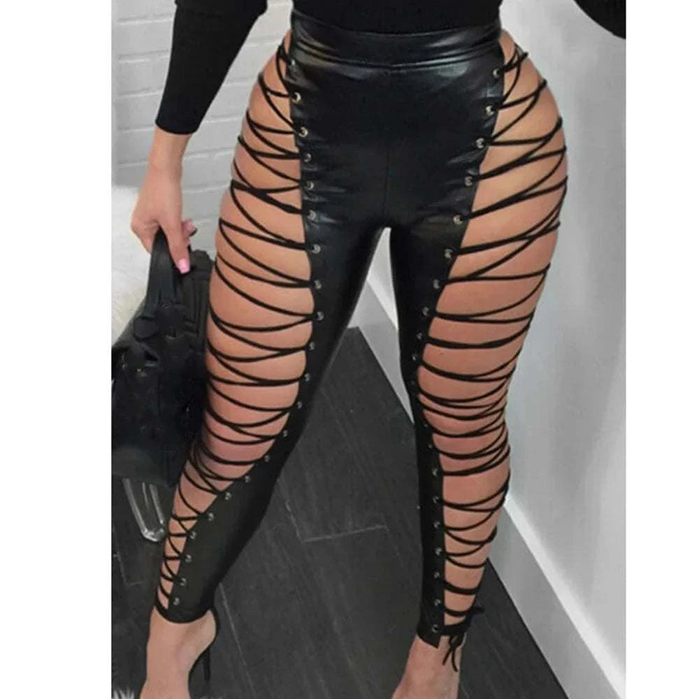 UnWritten Style faux leather leggings in black, with a high waist and dramatic side cutouts laced from hip to ankle.
