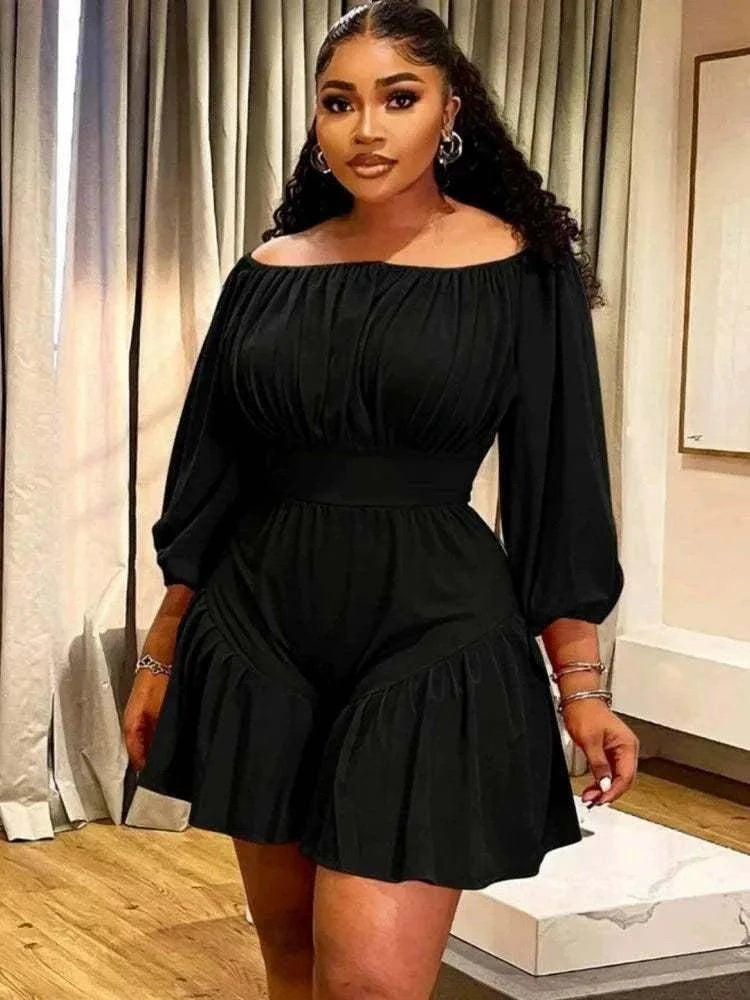 Midnight Muse Off-Shoulder Mini Dress in black, with a gathered neckline, long balloon sleeves, fitted waist and flared skirt.