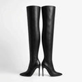 Knee-high black leather-look boots by UnWritten Style, with a smooth finish, pointed toes and slim stiletto heels.