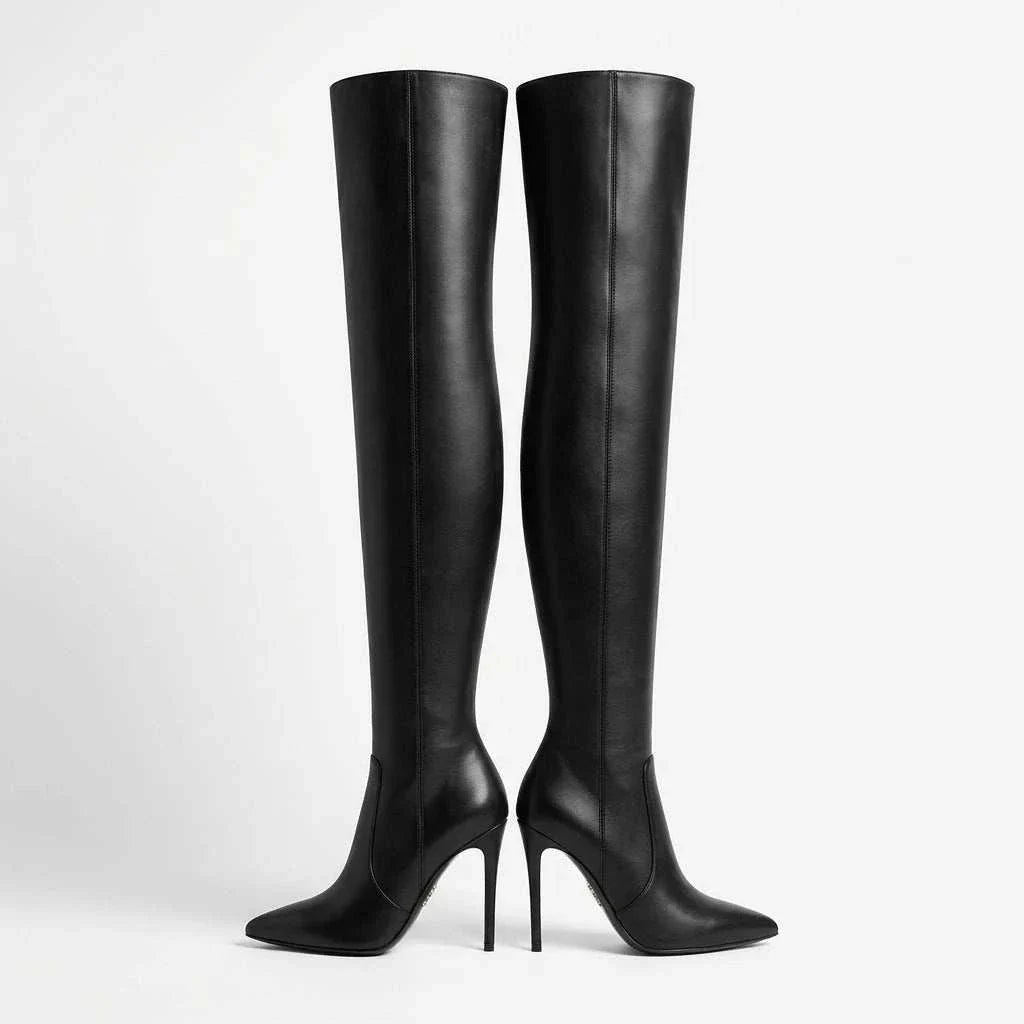 Knee-high black leather-look boots by UnWritten Style, with a smooth finish, pointed toes and slim stiletto heels.