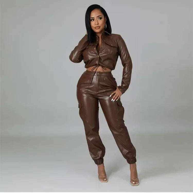Faux leather two-piece set in chocolate brown, with a cropped tie-front jacket and cuffed jogger pants, UnWritten Style.