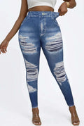 UnWritten Style denim illusion leggings in blue stretch fabric, with a high waist, jean-style seams and distressed white rips.