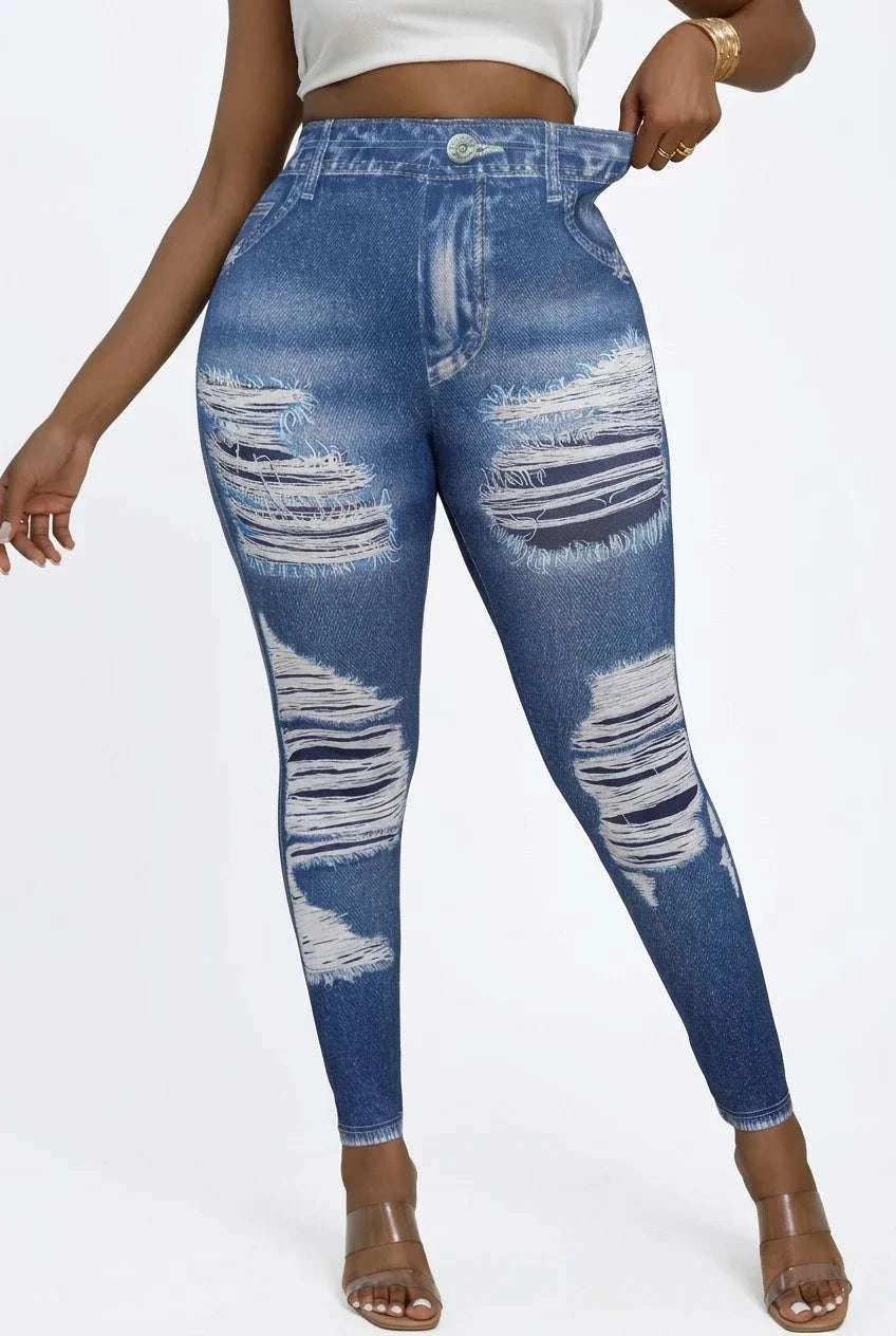 UnWritten Style denim illusion leggings in blue stretch fabric, with a high waist, jean-style seams and distressed white rips.