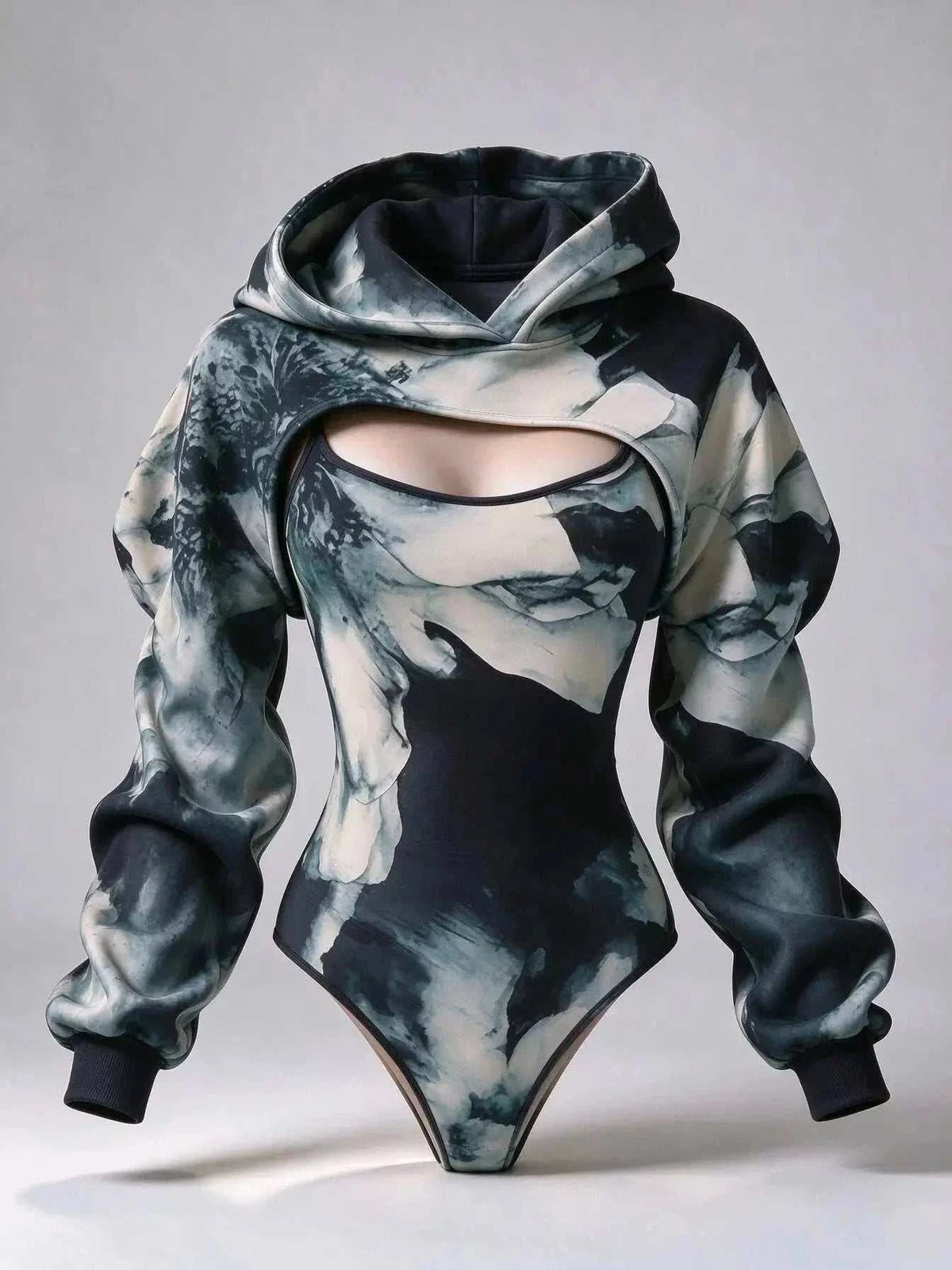 UnWritten Style hoodie bodysuit in black, gray and ivory abstract print, with chest cutout and oversized sleeves