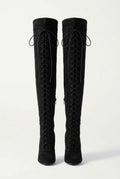 UnWritten Style thigh-high black suede boots with full-length front lacing, rounded toes and slim heels
