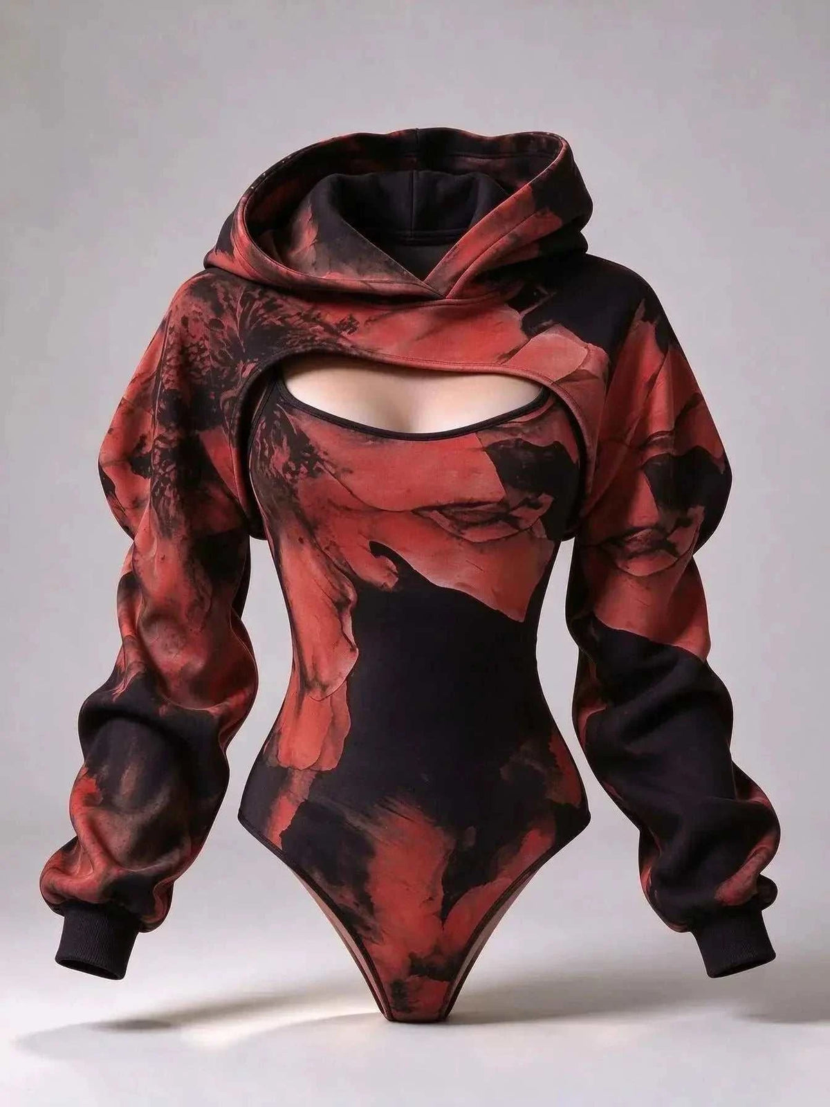 UnWritten Style cropped hoodie bodysuit in red and black abstract print, with a chest cutout and oversized sleeves